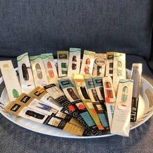 Bundle of 21 vintage zippers in a variety of sizes and colors.